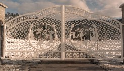 Powder Coated White Gate with a lot of detailed scroll work