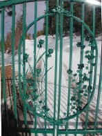 Artistic Floral Work Enhanced The Beauty Of This Walk Gate