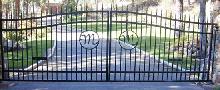 Ornamental Double Drive Gate With Monogram