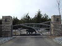 Large brick columns are used to accent this gate